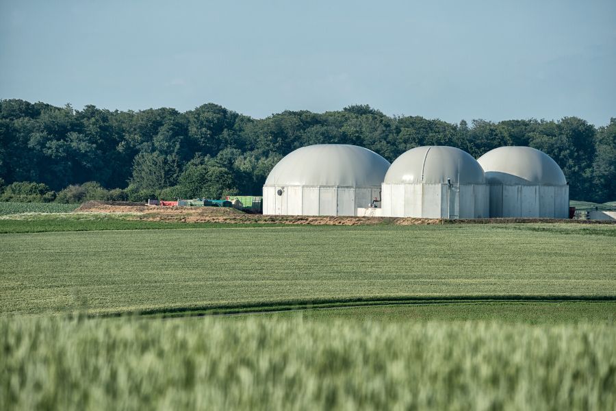 Biomass energy plant in rural landscape